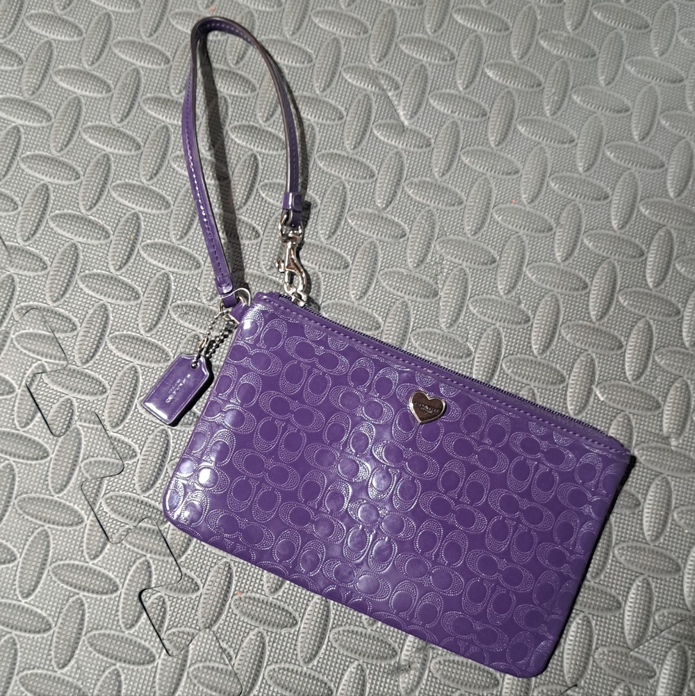 Coach purple liquid gloss patent leather wristlet